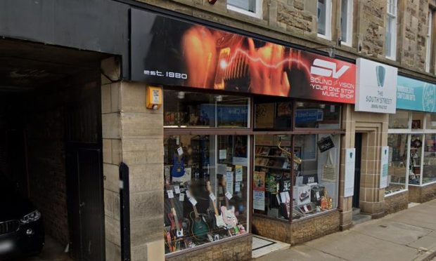 The man fell through the roof of the Sound and Vision shop on South Street.