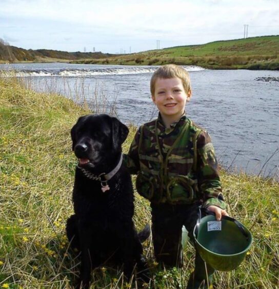 Sweyn with Sadie the black lab 