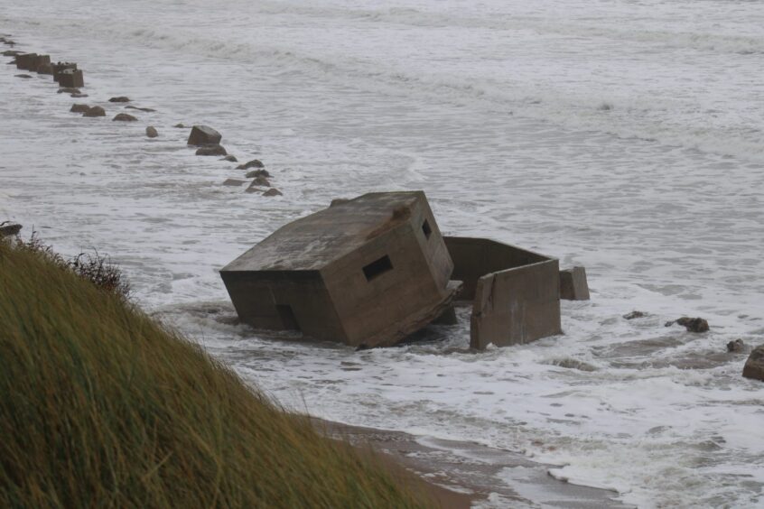 A pillbox at Blackdog during Storm Babet. 