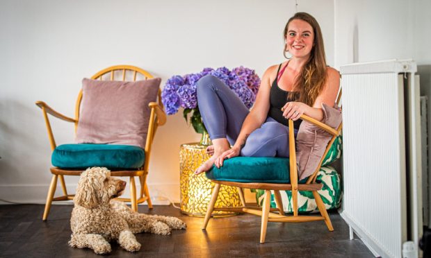 Aberdeen yoga instructor Laura Watt with labradoodle Maggie