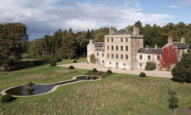 Ewan Edwards and Louise Campbell with their children William and Astrid at their Beech Manor property in Stoneywood. Picture by Kath Flannery.