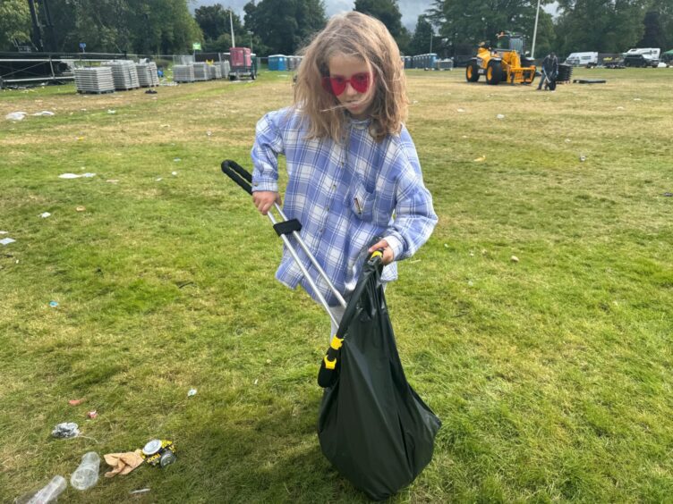 Sophie Barber, 8, litter-picking at Cooper Park.