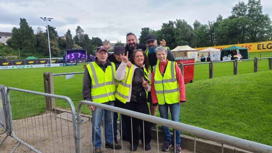 The volunteers with the Elgin festival organiser Andy Macdonald. 