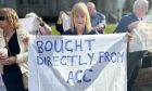 Torry resident Dianne McDonald at a homeowner-led demonstration outside Aberdeen City Council offices.