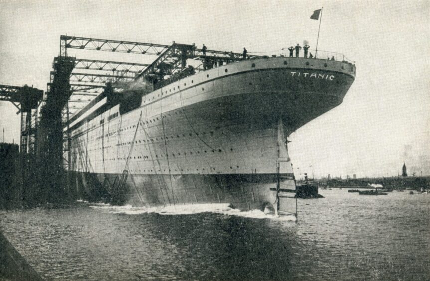 Titanic being launched at the Harland and Wpolff shipyard.