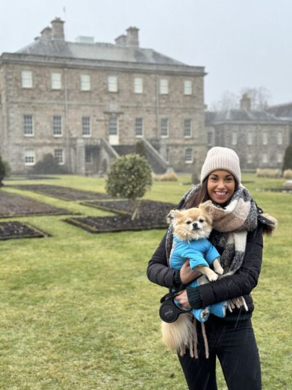 Laura Phillips and her dog at Haddo House.