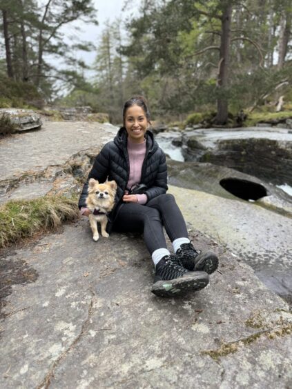 Enjoying a family day out in Braemar is Laura Phillips and her dog Teddy.