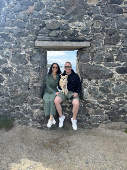 Craig and Laura Phillips at Portsoy with their wee dog Teddy.