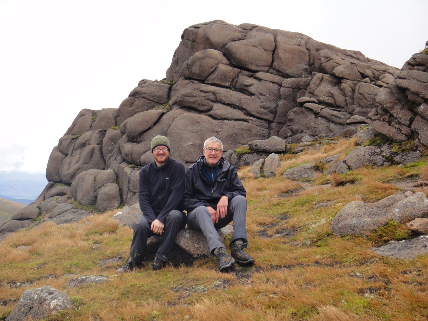 Mitch Hislop and his son on a hill walk 