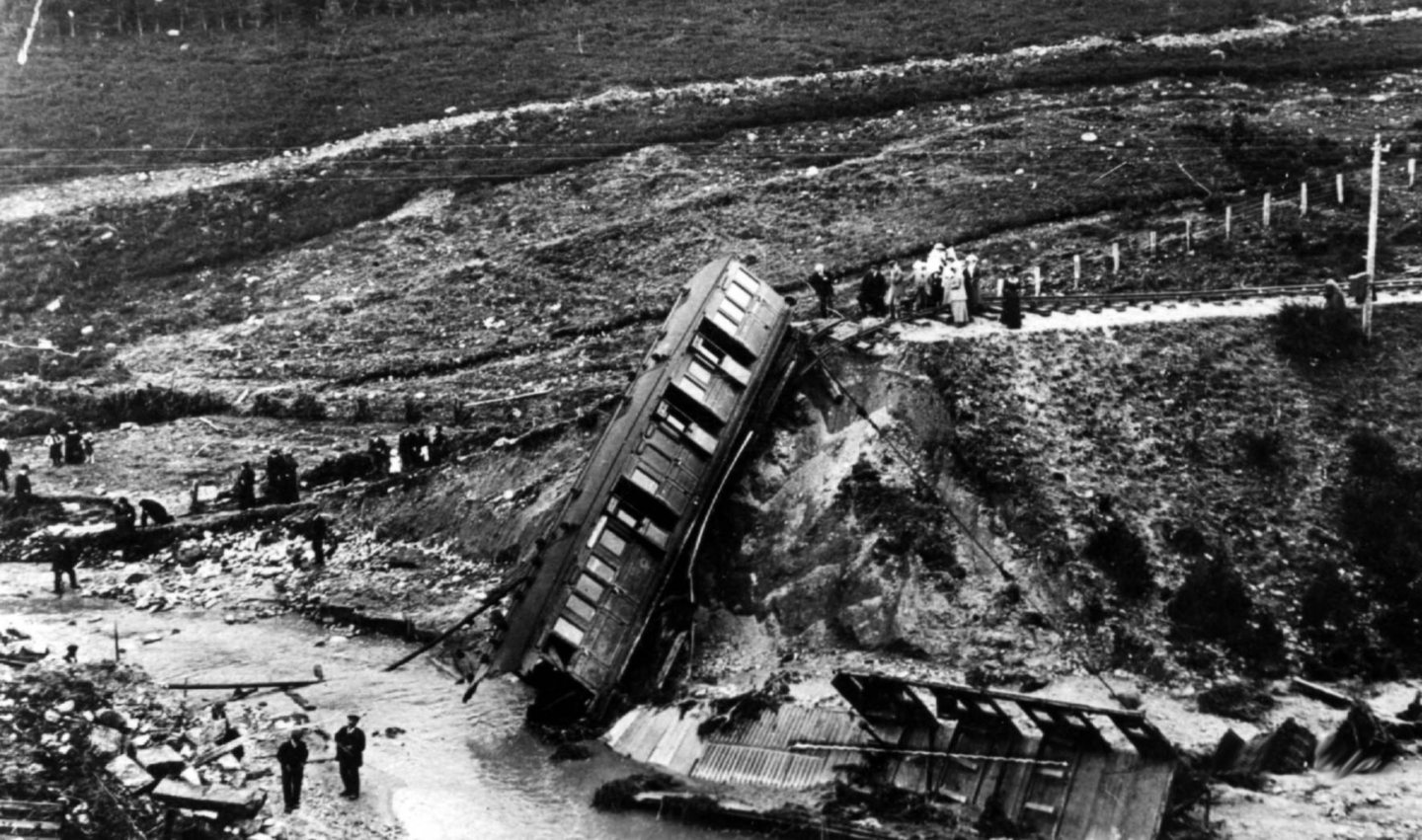 Part of train lies in the stream after the bridge collapse near Carrbridge in 1914.