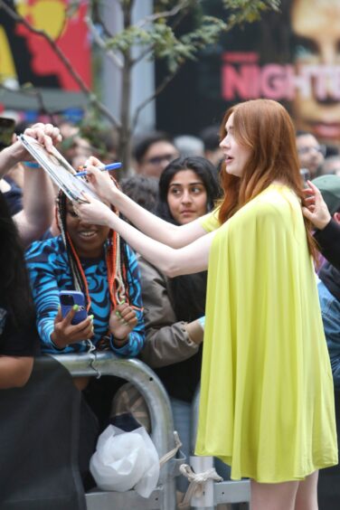 Karen Gillan with a baby bump. 