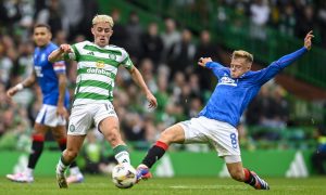 Celtic's Luke McCowan (L) and Rangers' Connor Barron in action. Image: SNS