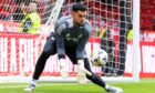 Dimitar Mitov warms up before a William Hill Premiership match between Aberdeen and Motherwell at Pittodrie Stadium on September 14, 2024. Image: SNS.