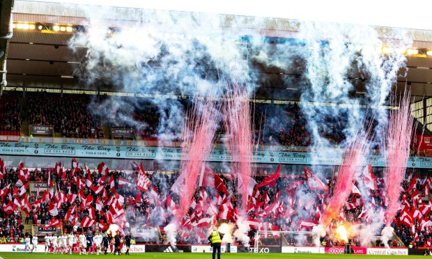 An Aberdeen fan display at Pittodrie Stadium ahead of a match between the Dons and Motherwell