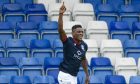 Akil Wright celebrates netting against Dundee. Image: SNS