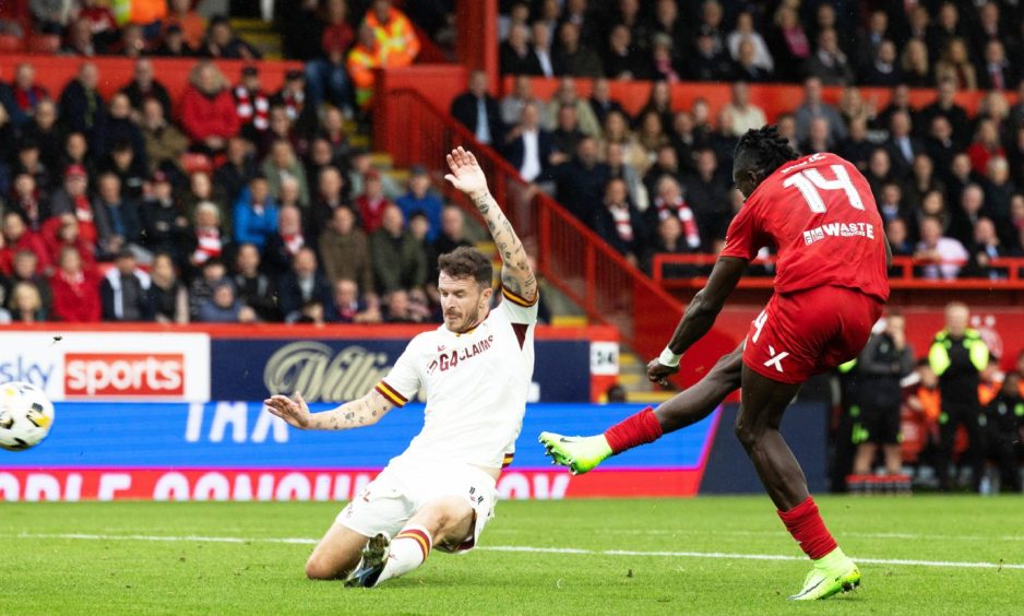 Aberdeen's Pape Gueye scores a superb solo goal to make it 1-0 against Motherwell.