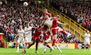 Aberdeen's Slobodan Rubezic has a headed chance during the 2-1 win against Motherwell at Pittodrie. Image: SNS