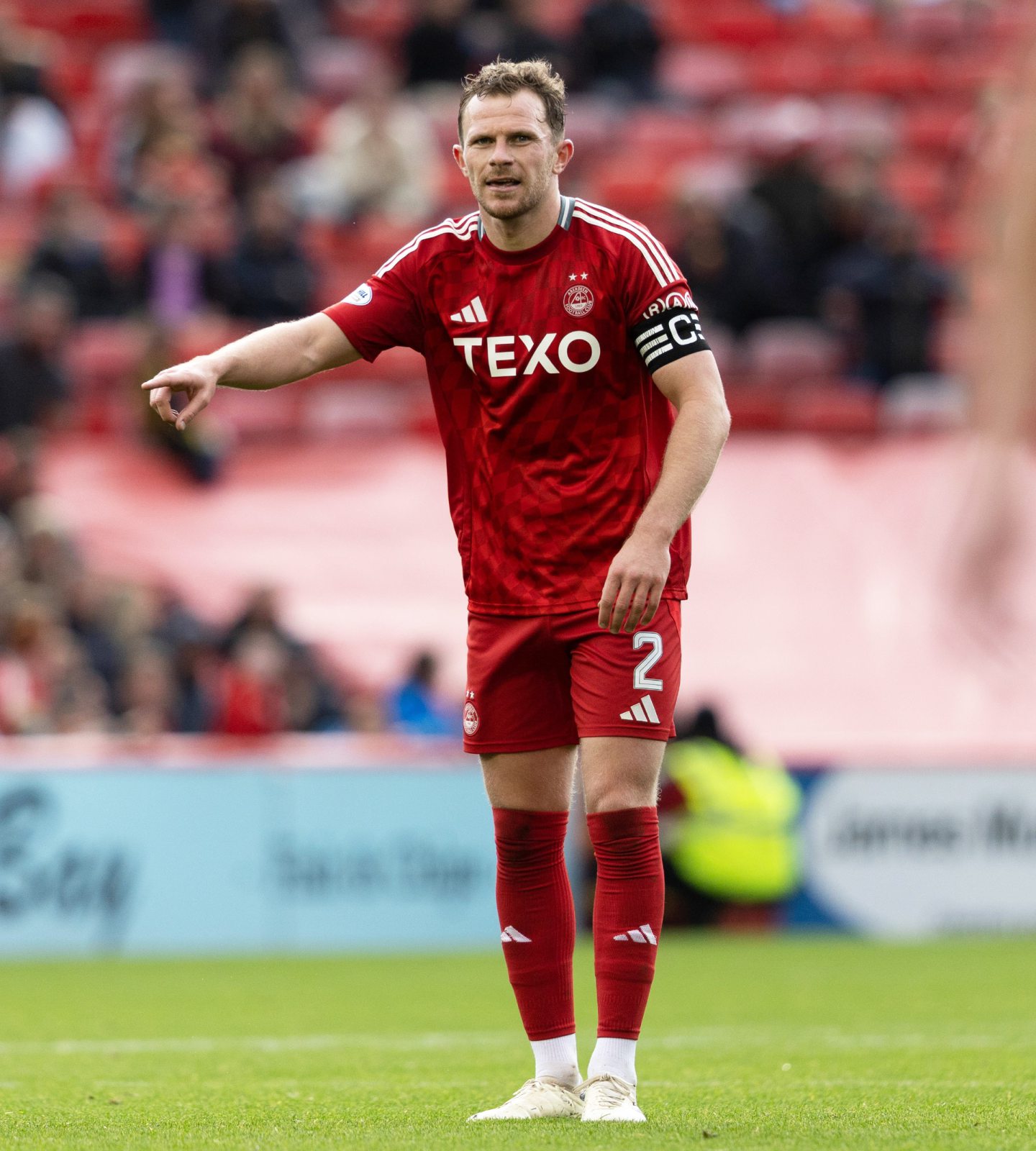 Aberdeen's Nicky Devlin wearing the captain's armband during the 2-1 Premiership win against Motherwell. Image: SNS