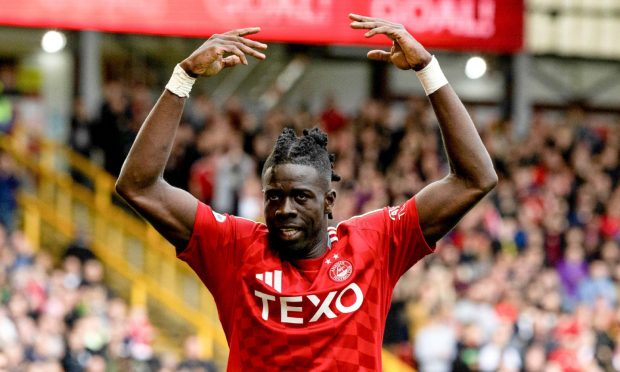 ABERDEEN, SCOTLAND - SEPTEMBER 14: Aberdeens Pape Gueye celebrates scoring to make it 2-0 during a William Hill Premiership match between Aberdeen and Motherwell at Pittodrie Stadium on September 14, 2024, in Aberdeen, Scotland. (Photo by Craig Foy / SNS Group)