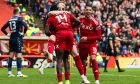 Aberdeen's Nicky Devlin celebrates with Pape Gueye after the striker scored in the 2-1 win against Motherwell. Image: SNS