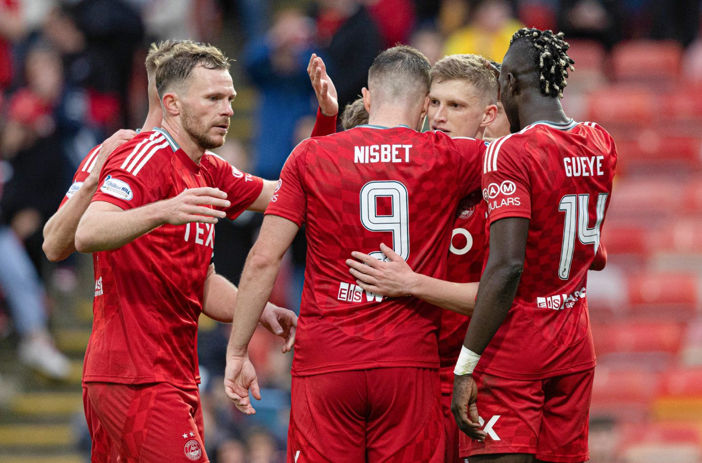 Aberdeen players celebrate after Kevin Nisbet scores to make it 2-0 against Spartans. Image: SNS 