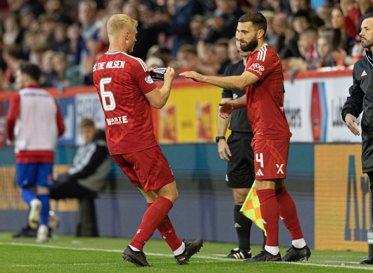 Aberdeen's Graeme Shinnie replaces Sivert Nilsen during a Premier Sports Cup quarter-final match against Spartans. Image: SNS