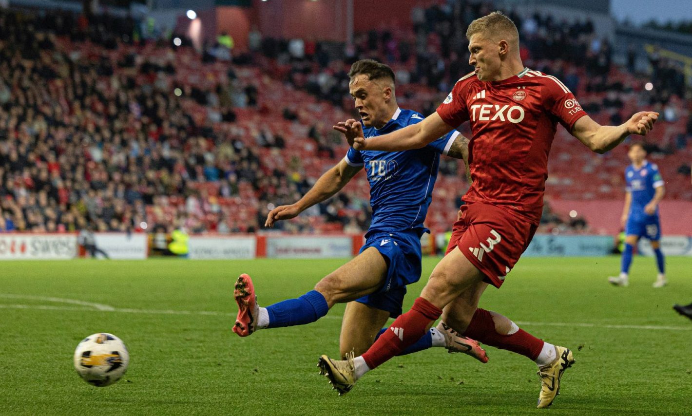 Spartans' Mark Stowe (L) and Aberdeen's Jack MacKenzie in action during a Premier Sports Cup quarter-final match. Image: SNS