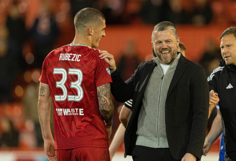 Aberdeen's Slobodan Rubezic with manager Jimmy Thelin at full-time after Premier Sports Cup quarter-final win over Spartans. Image: SNS.