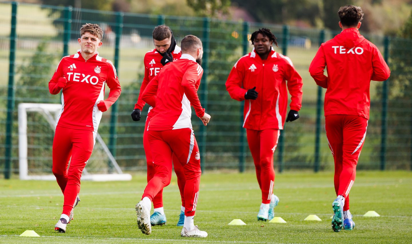 Leighton Clarkson, Kevin Nisbet and Peter Ambrose during an Aberdeen training session at Cormack Park. Image: SNS 