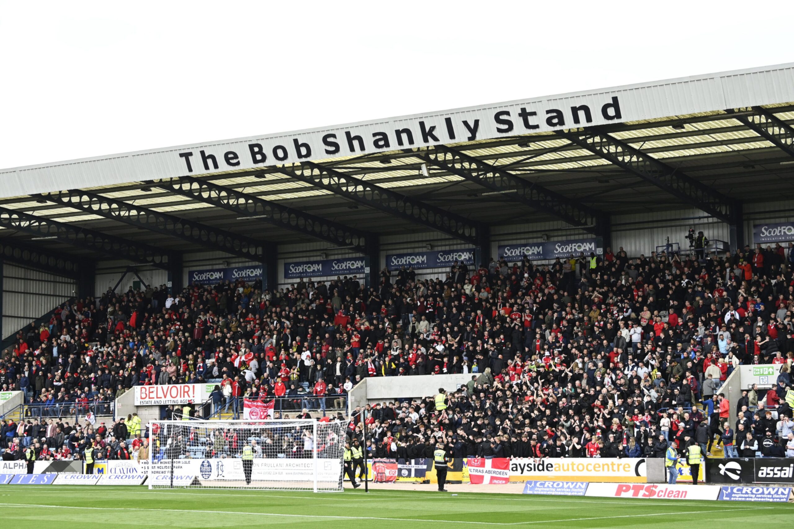 Aberdeen away support during the Premiership clash against Dundee. Image; SNS