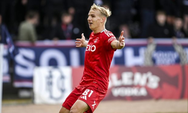 Aberdeen's Topi Keskinen celebrates after scoring to make it 2-0 against Dundee. Image: SNS