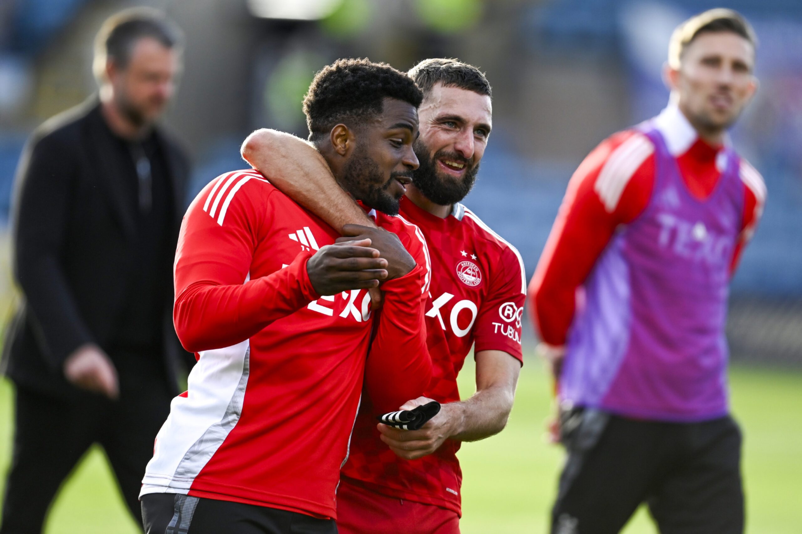 Aberdeen's Luis 'Duk' Lopes and Graeme Shinnie at full-time after the 2-1 win against Dundee. Image: SNS 