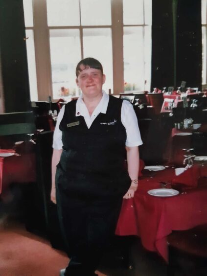 Irene Parker in her work outfit in the dining room of The Regent Hotel in Oban. 