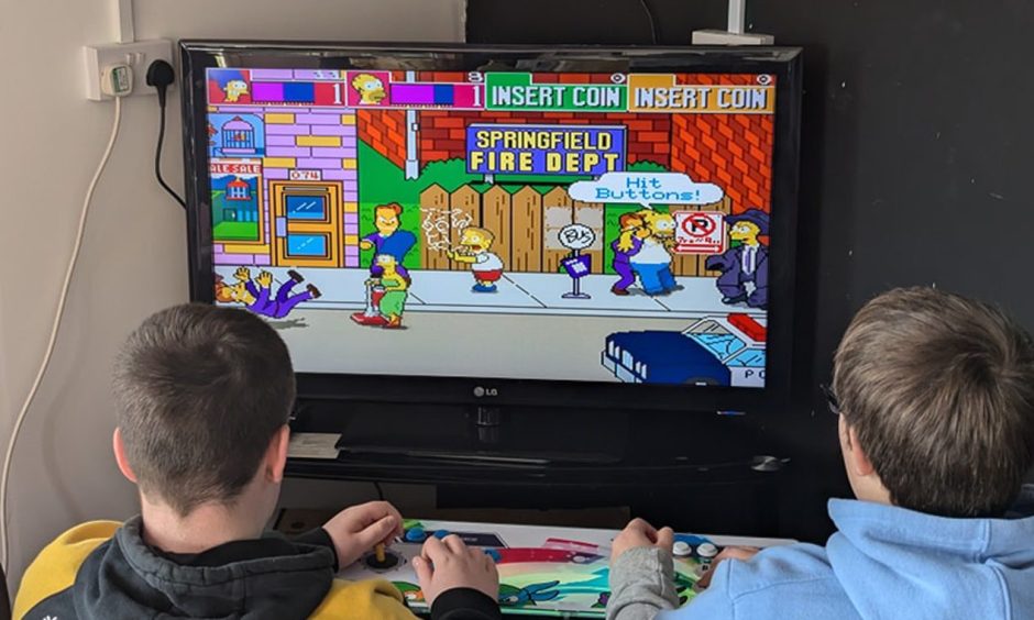 Gamers in the Legend Arcade in the Plantation in Fort William. 