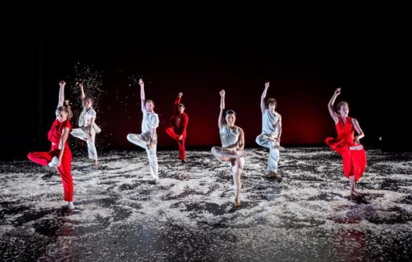 Dancers on dark stage for Jasmin Vardimon Company’s ‘NOW’.