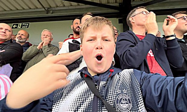 Aaron celebrates an Aberdeen goal.