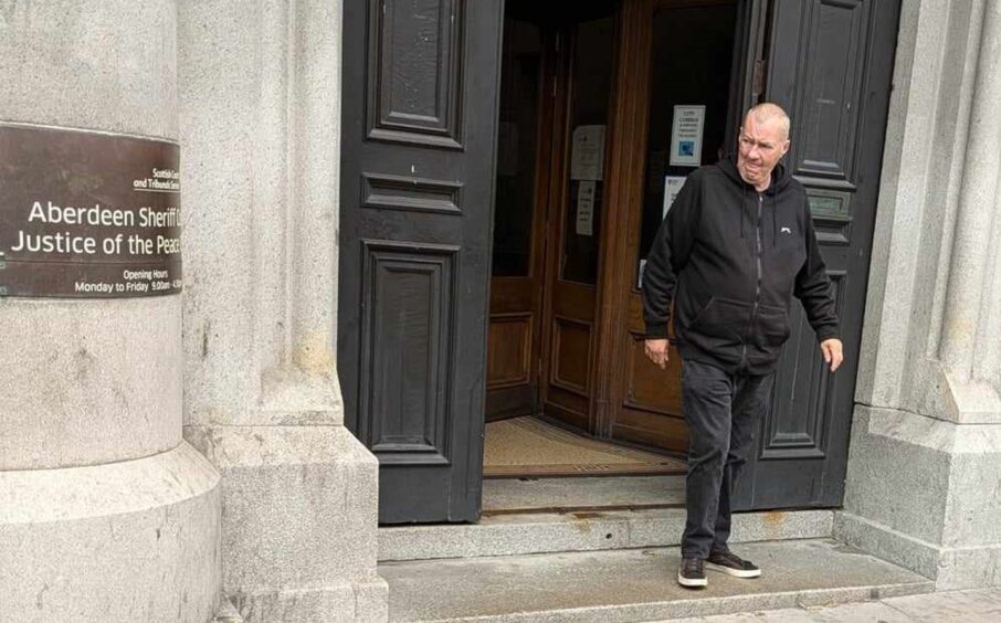 Alastair Robertson leaving Aberdeen Sheriff Court. 