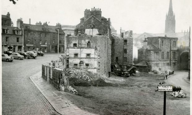 St Nicholas Street as it was in 1923, left, and in the 2000s, right, surrounded by P&J headlines about its redevelopment. Image: DC Thomson/Roddie Reid