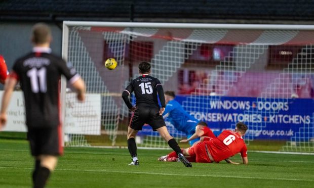 Cameron Angus celebrates scoring for Deveronvale against Wick Academy