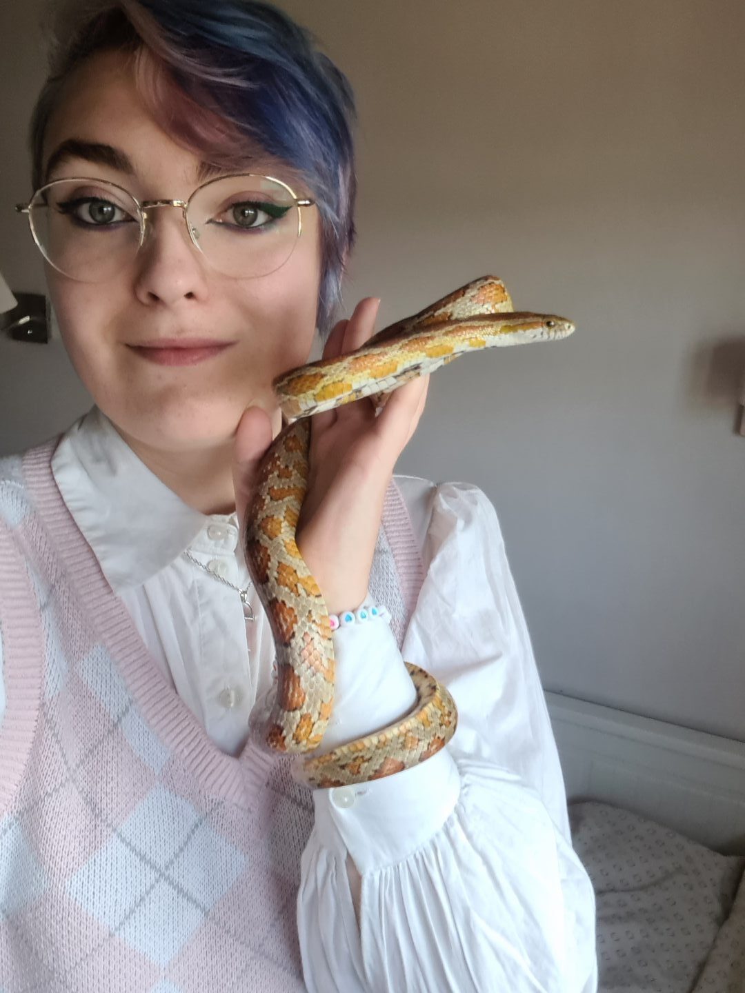 Ember the corn snake and her Aberdeen owner Caitlin