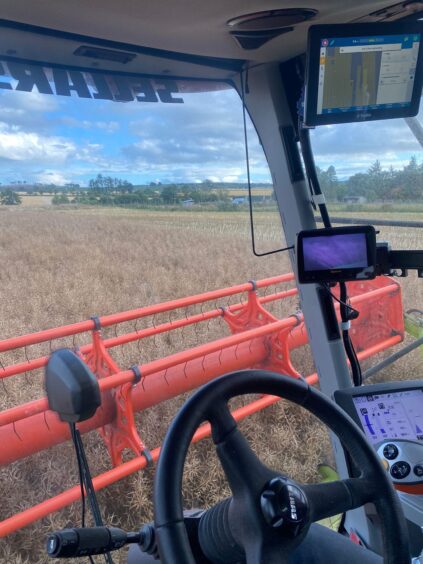 Farm view from the wheel of a combine