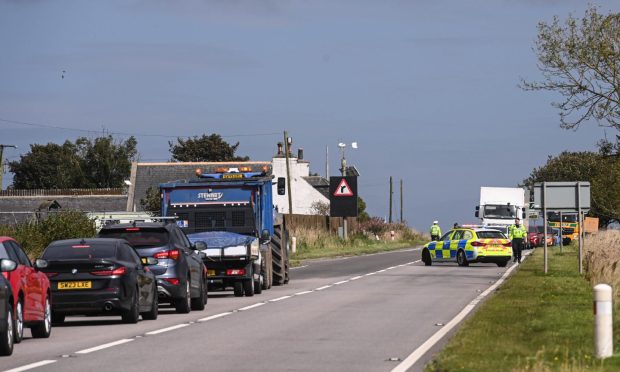 Tailbacks on the A90 as police car blocks one lane of A90