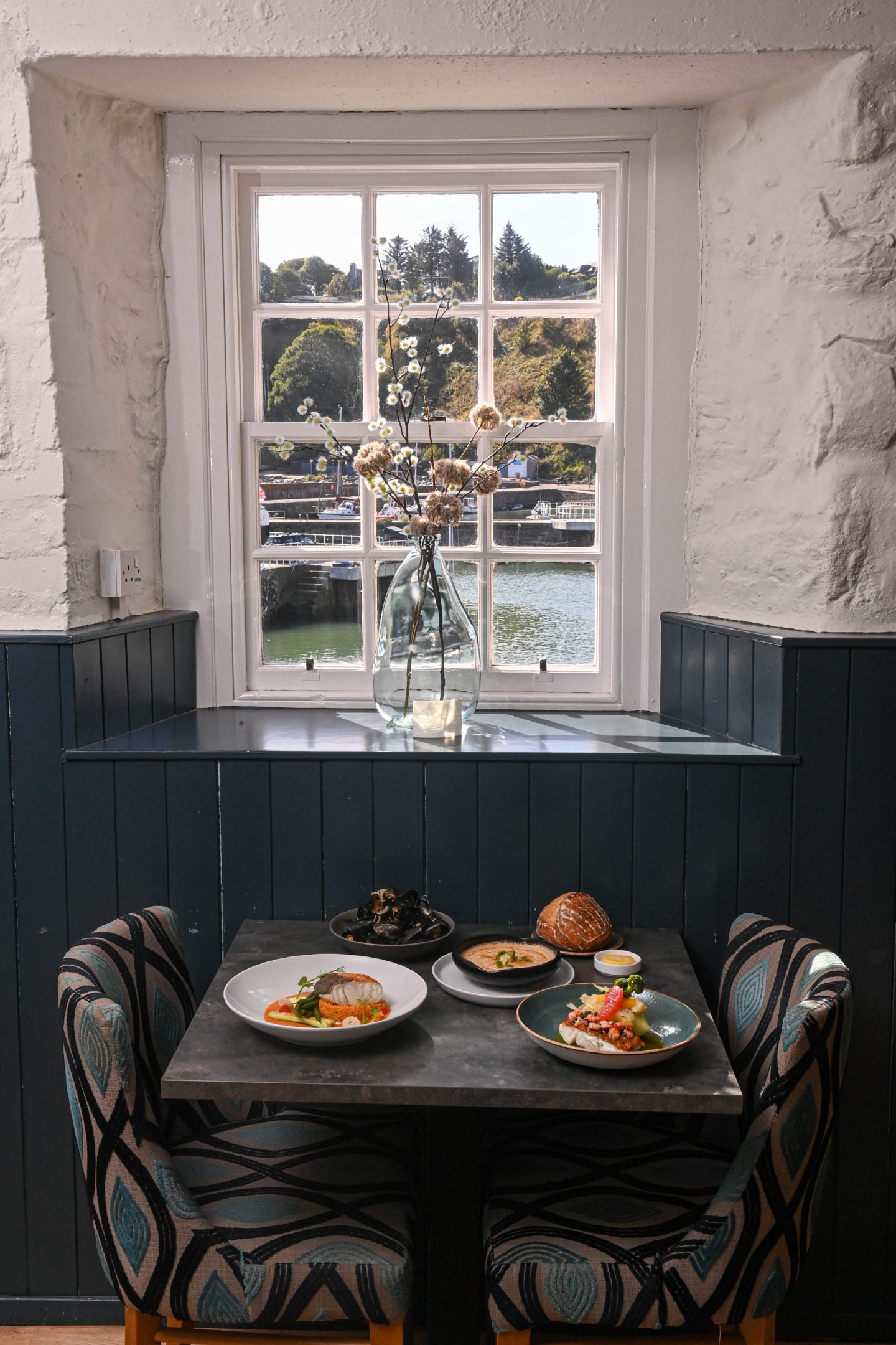 A table by the window in the Tolbooth Seafood restaurant in Stonehaven.