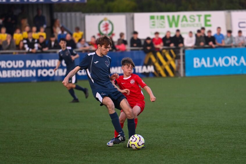 Alex Bradford challenging for the ball.