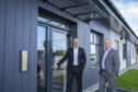 (Left)  New Head of the Elgin office Scott Dunbar pictured at the firm's new headquarters with Craig MacPherson(right), who has led the Elgin office for the last 15 years.