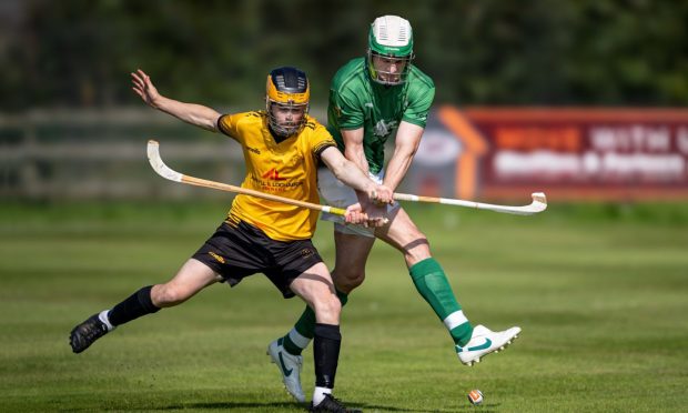 Lorne Mackay in action against Newtonmore in the 2018 Camanachd Cup final.