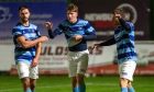 Liam Duell, centre, celebrates scoring for Banks o' Dee against Formartine United. Pictures by Jasperimage.