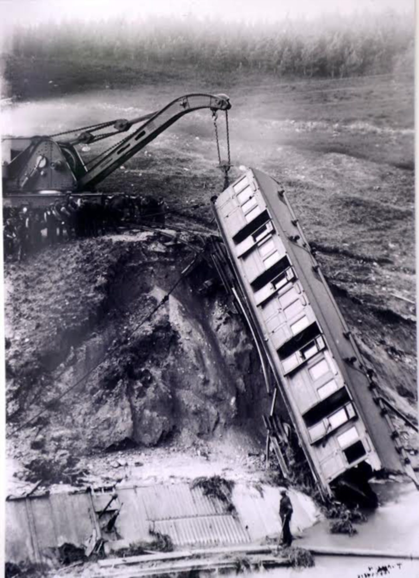 Crane pulls train out of stream following the accident at Carrbridge.