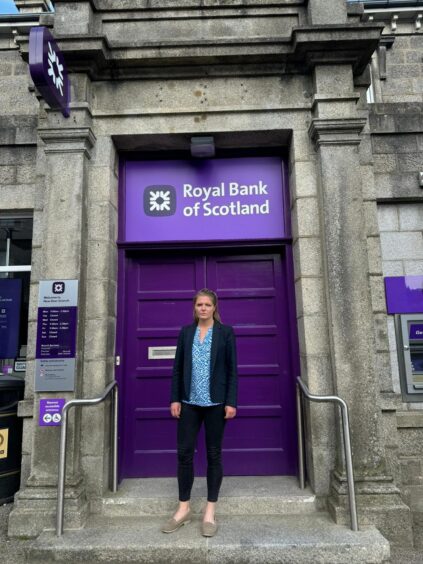 Harriet Cross outside the New Deer RBS branch.