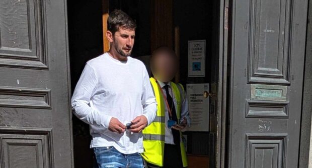 To go with story by Bryan Rutherford. 120mph suspected drink-driver jumped out of vehicle and provoked foot pursuit. Picture shows; Liam Taylor outside Aberdeen Sheriff Court. Aberdeen Sheriff Court. Supplied by DC Thomson Date; 10/09/2024